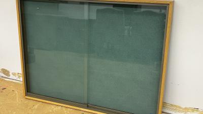 Display case with sliding glass doors
